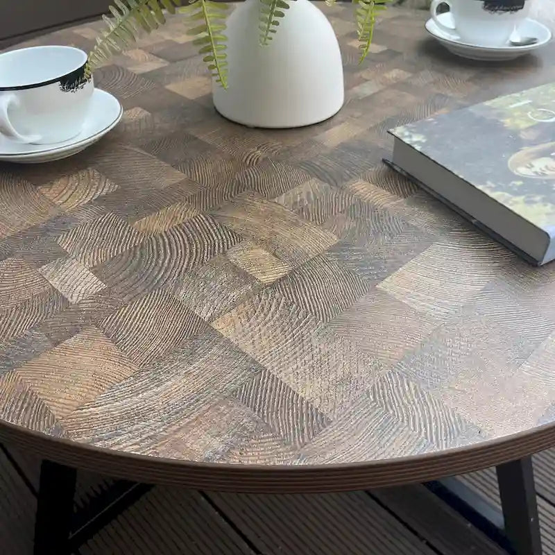 Table basse ronde en bois imitation grain de bois et métal noir